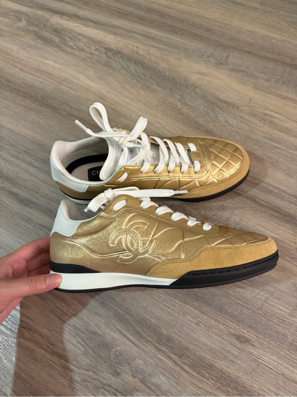 CHANEL Metallic Gold and White Quilted Low-Top Sneakers